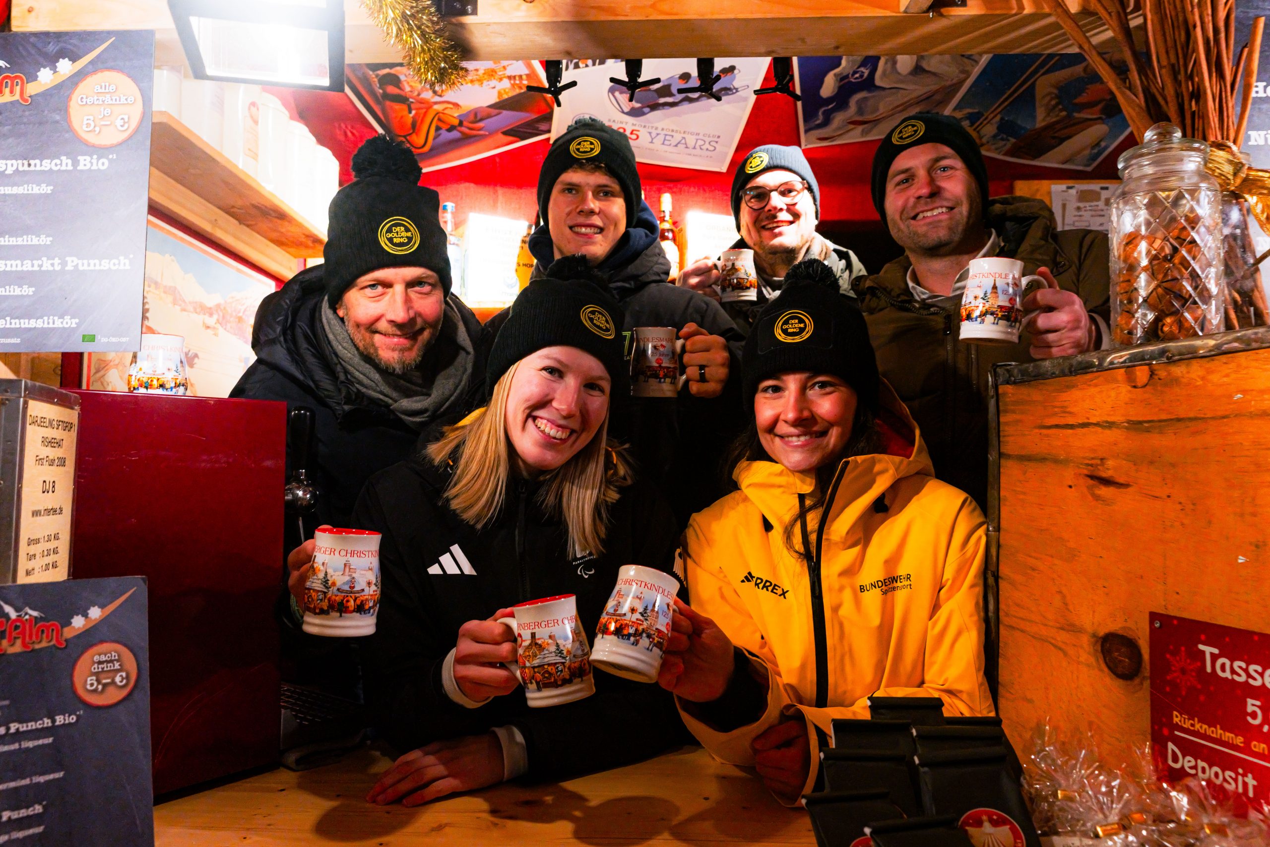 Der GOLDENE RING beim Charity-Ausschank an der Glüh'Alm des Kräuterhaus Wurzelsepp im Dezember 2025.